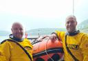 Andy Campbell (right, with trainer and assessor Aled Williams) has passed out as a helmsman for the RNLI