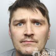 Charlie Moxom, 36, is wanted by police