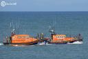 The old and new lifeboats at New Quay
