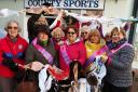 Members of Soroptimists International Haverfordwest and supporters hold their 'bra chain' aloft. PICTURE: Western Telegraph