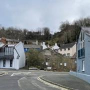 A new restaurant and apartments on the site of a disused former garage site in Fishguard’s Lower Town has been given the go-ahead. Picture: Pembrokeshire County Council webcast.
