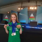 Lleucu-Haf Thomas shows off her 13 medals