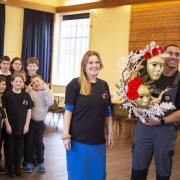 Rhian from Ser Aeron received a bouquet of flowers from rugby player Lloyd Lewis as part of an S4C programme which airs tonight. Picture: Ser Aeron