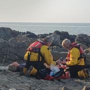 Dr Adrian Stallwood carrying out training with his colleagues at Cardigan RNLI