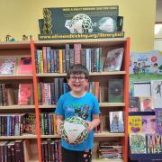 Riley is one of the youngsters taking advantage of the football library scheme on offer across Wales including in Cardigan, Aberporth and Llandysul. Picture: Morrisons