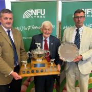 NFU Cymru county chairman Simon Davies, Idris Davies Memorial Award winner Meurig Harries and chairman of the award management committee, Jeff Evans. Picture: NFU Cymru