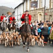 A large crowd watched the Vale of Clettwr Hunt parade past the Porth Hotel