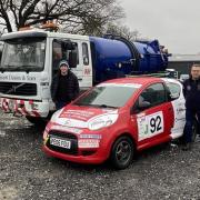 Vroom at the top? Teenage rally driver Henri Cynwyl and his support team.