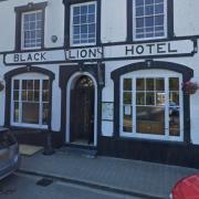 Three men are charged with a series of offences at The Black Lion in Aberaeron.