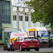 Police and Forensic investigators at Amman Valley school