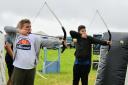 Best mates Alfie Phillips and Henri Cynwyl enjoying the archery challenge hosted by stall holder Aspirations who was attending the show for the first time this year. 