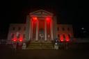 The Council’s buildings are being lit in red every night until Sunday as a mark of Remembrance.