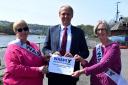 Ben Lake is pictured previously signing the WASPI Pledge with WASPIs Melinda Williams and Pamela Judge.