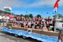 Lowri Jones dancers on their boat of a float. Picture: Western Telegraph