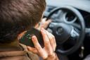 Drivers are warned about using phones while driving. Picture: Canva