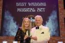 Marged Rees being presented with the Best Musical Act west Wales by David Emanuel