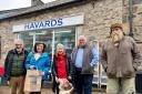 Cris Tomos, Eluned Morgan MS, Ros McGarry with Floss the dog, Chris Morgan and John Harries, outside the Havards hardware store.