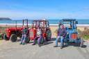 Lead tractor drivers and the last closing tractor driver L-R Peter Davies, Jeff Jones and Brynmor at Penbryn Beach with their tractors