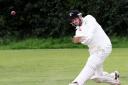Narberth's Will Nicholas takes a superb catch to dismiss Nick Koomen leaving him just two runs short of a total of 1,000 league runs for the season