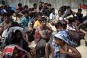 The UN refugee agency sounded the alarm for hundreds of Rohingya Muslims believed to be aboard two boats reported to be out of supplies and adrift on the Andaman Sea (AP)
