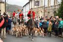 A large crowd watched the Vale of Clettwr Hunt parade past the Porth Hotel