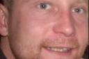 The family has paid tribute to a devoted son - John Bell, aged 37. Meanwhile a man remains in custody on suspicion of murder