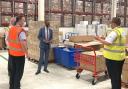 Health minister Vaughan Gething at the NHS Wales national distribution centre today.