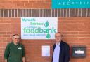 Mr Lake is pictured with Cardigan Foodbank manager Alan Faunch.