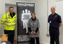 MS Joyce Watson is flanked by Rob Makepeace (MAWW Fire Service ) and Anthony Evans, of Dyfed-Powys Police.