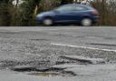 Cardigan town councillors have condemned the state of the road on Maesglas.