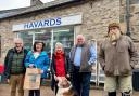 Cris Tomos, Eluned Morgan MS, Ros McGarry with Floss the dog, Chris Morgan and John Harries, outside the Havards hardware store.