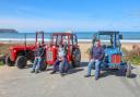 Lead tractor drivers and the last closing tractor driver L-R Peter Davies, Jeff Jones and Brynmor at Penbryn Beach with their tractors
