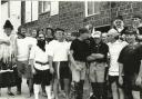 In New Quay, a group of the young fishermen of the town, play the part of pirates in a community play. The producer, the poet Dot Clancy whose idea the community play was, died some years ago. Picture was taken around 1989