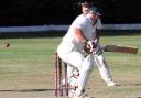 Tom Mansbridge who topscored for Saundersfoot with 54 takes the wicket of Harry Phillips