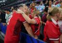 Newcastle Emlyn's Gareth Davies (wearing 9) with family and friends after Wales' quarter final defeat against Argentina.