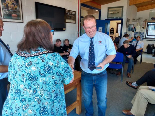 Tivyside Advertiser: The lifeboat crew's jubilee medals were presented by Mayor Maccarney