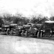 Daniel Davies, Maesycoed (right) and his sons with their taxi cars in 1925