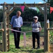 MP Ben Lake cut the ribbon to officially open Nicky’s Orchard at Coedmor Jubilee Woods, Llangoedmor, Cardigan.