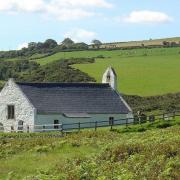 Cardigan councillor Clive Davies believes Mwnt Church can be made more secure.