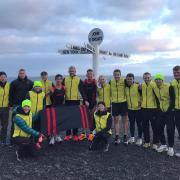 Cardigan's Nerys Jones (standing in green hat on left) was among a dozen army PTIs who put their best foot forward to raise funds for the Royal British Legion. Picture: British Army.