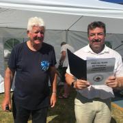 Aberporth's big day: Village Hall chairman Mike Harwood is pictured with Cllr Clive Davies.