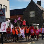Royal Mail workers on strike in Cardigan today, August 31