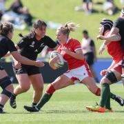 SURROUNDED: Wales' Elinor Snowsill is tackled by the New Zealand defence