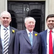 Kaye Mansel Davies is flanked by his son, Stephen (left) and Preseli Pembrokeshire MP Stephen Crabb at a Downing Street reception in 2016. PICTURE: Welsh Conservatives.