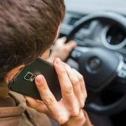 Drivers are warned about using phones while driving. Picture: Canva