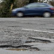 Cardigan town councillors have condemned the state of the road on Maesglas.