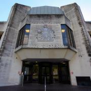 Saxton admitted assaulting a police officer when he appeared at Swansea Crown Court.