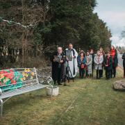 The unveiling and blessing of the Care Wales memorial bench.