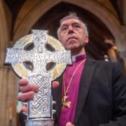 Archbishop of Wales Andrew John with The Cross of Wales (Peter Powell/PA)