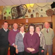 The operators of Cenarth Falls Holiday Park in 2014 with Elin Jones AM and local county councillor Lyndon Lloyd, at the Coracles Health and Country Club, which is part of the park.